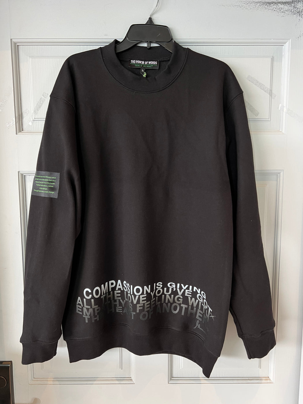Unisex Compassion Crewneck Long sleeve Sweatshirt in Black